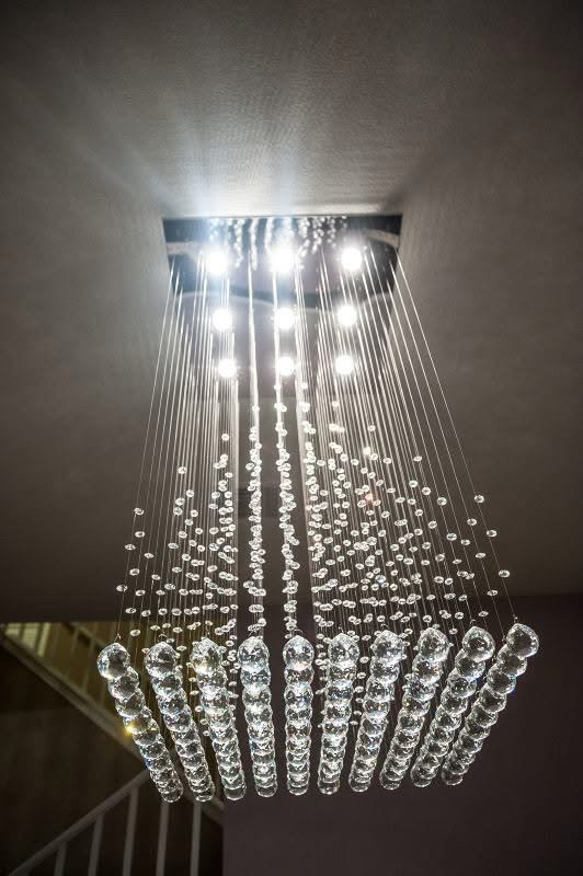 Tall crystal chandelier seen from below